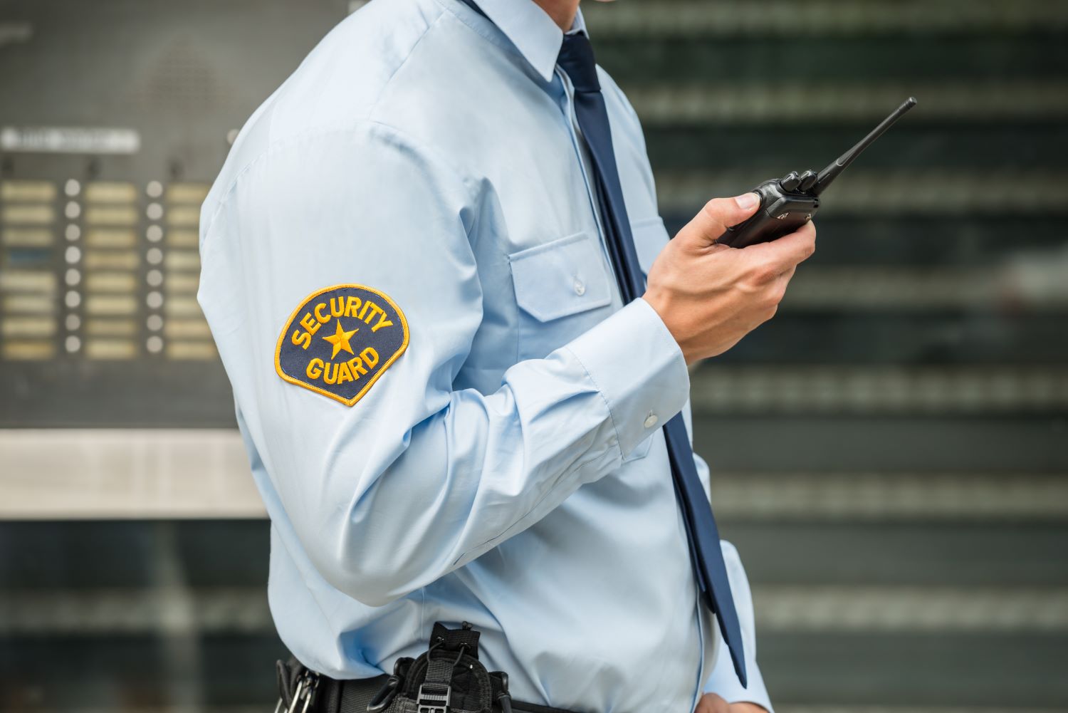 School security guard with portable radio