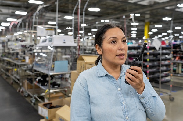 woman using the Motorola R2 radio